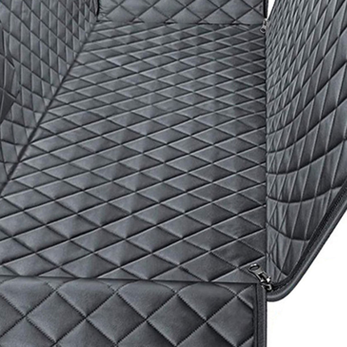 Close-up of the car seat cover's diamond quilting and its zip