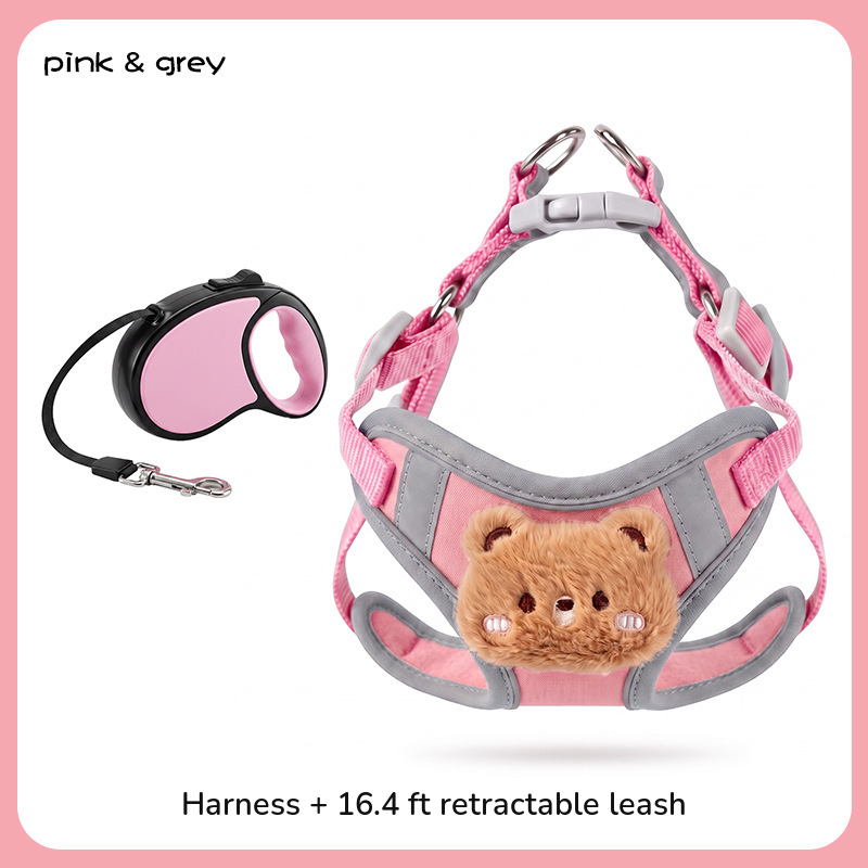 Pink and grey vest harness shown with a black and pink retractable leash; labelled harness plus 16.4 ft retractable leash