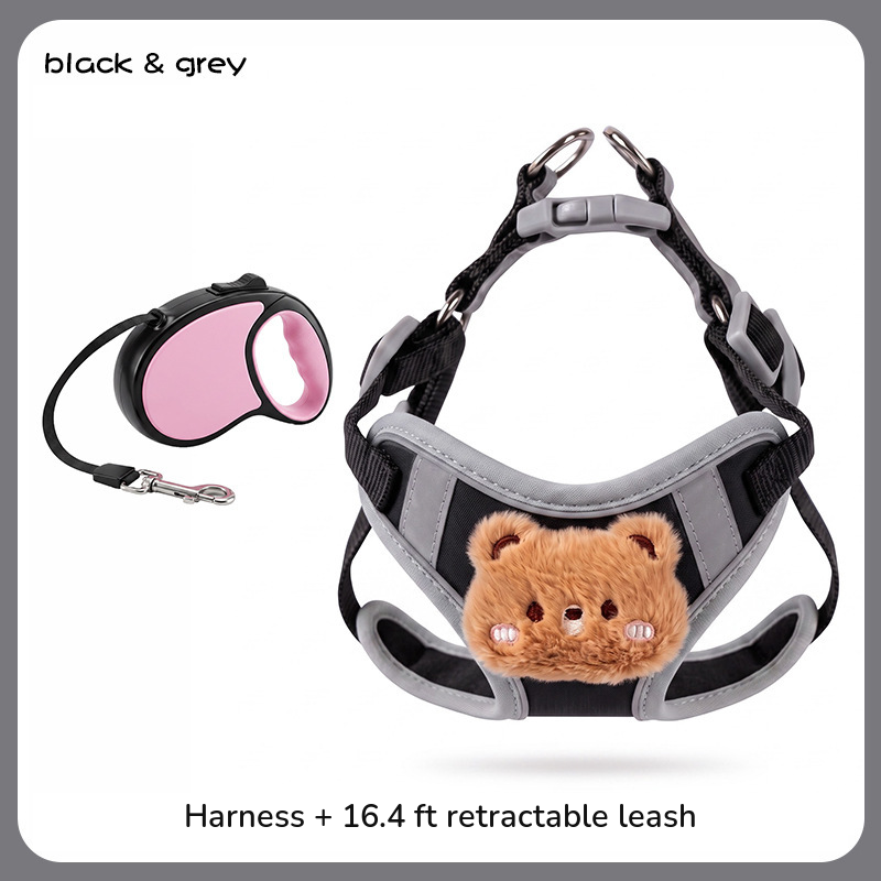 Black and grey vest harness shown with a black and pink retractable leash; labelled harness plus 16.4 ft retractable leash